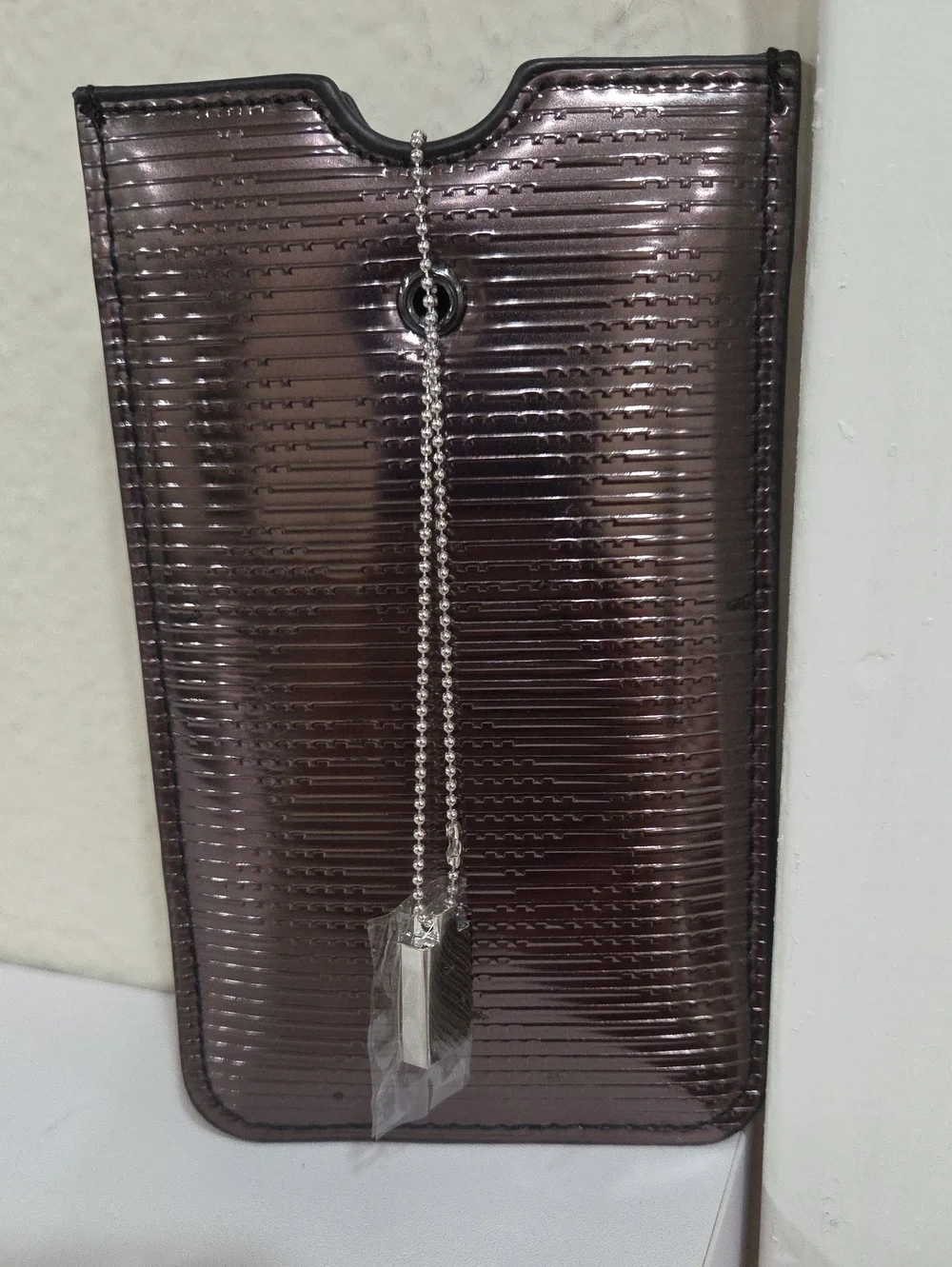 Burberry Metallic Bronze Sleeve with Silver Charm